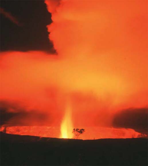 photo of red-hot lava and crater rim