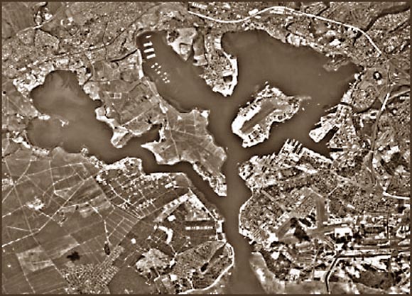 Black and white aerial photograph of Pearl Harbor region on Hawai'i.