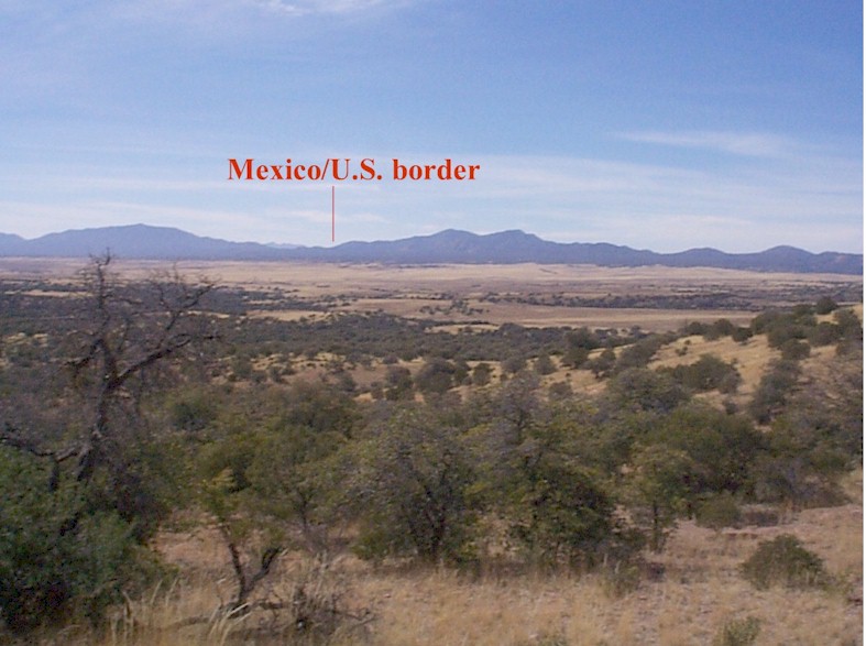 View of the San Rafael Valley, Arizona from the Canelo Hills looking to the southwest. The U.S.- Mexico border is shown where it crosses the Patagonia Mountains.