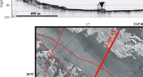 Figure 12. Sidescan sonar image from Las Vegas Bay showing the low-backscatter sediment cover in the narrow valley floor and the high-backscatter signature from the rock faces adjacent to the floor.