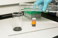 Place a sample in each beaker and add about 50-100 ml of dilute hydrogen peroxide and stir beaker with rod.