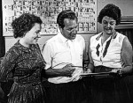 Dr. Jobst Holsemann, WHOI, (center) confers here with his assistants, Miss Paula A. Wiercinska (left), and Mrs. Medlyn Hamilton (right).