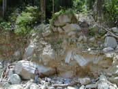 Prehistoric debris-flow deposit (7.7-m thick) undermined in channel bank
