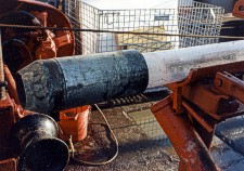 Close-up of unused core liner with a core cutter attached and ready for use.