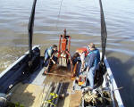 Picture of USGS employees retrieving BC-1.
