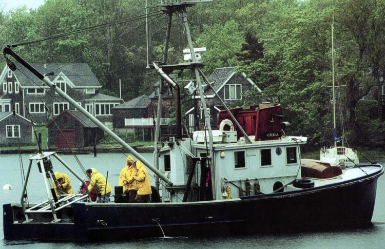 The Woods Hole Oceanographic Institution Research Vessel ASTERIAS during deployment of a damped corer.