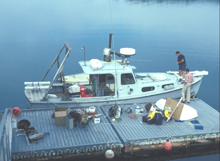 The Research Vessel LEE at dock with gear being loaded.