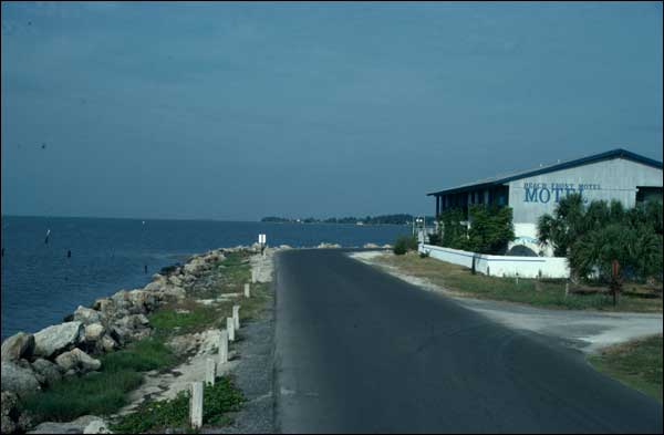 This beachfront motel on the low-energy west Florida coast at Cedar Key has no beach because riprap was placed on the shore to reduce long-term erosion.