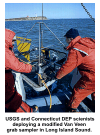 USGS and Connecticut DEP scientists deploying a modified Van Veen grab sampler in Long Island Sound.