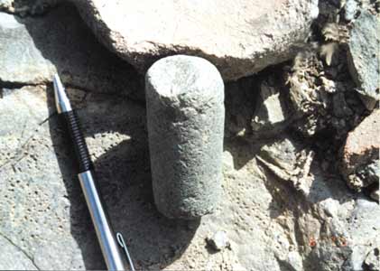  Andesite cylinder that may have been used as an anvil for making metal foils, found near Santa Rita B