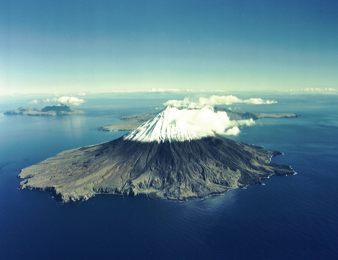 photo looking down on volcano from fairly low-flying aircraft