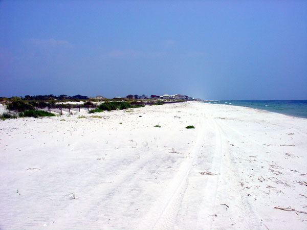 Wide natural beach.