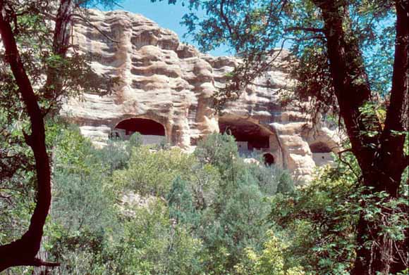 photo of cliff with dwellings in it
