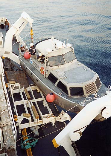 Figure 6, photograph showing Launch boat being deployed from the NOAA Ship Thomas Jefferson. 