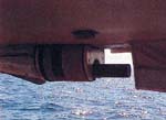 Thumbnail image of figure 6, and link to larger figure. Photograph of the multibeam sonar instrument mounted to the research vessel.