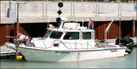 Thumbail image for Figure 3, Photograph of the USGS R/V Rafael tied to the dock, and link to larger image.