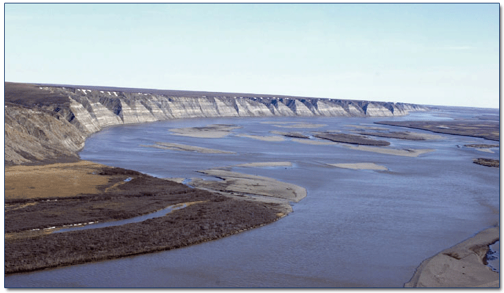 View northward along Colville River, central North Slope of Alaska. Upper Cretaceous strata exposed in river bluffs. Location near confluence of Anaktuvuk and Colville Rivers, about 90 miles southwest of Prudhoe Bay.