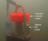 Thumbnail image for figure 11 and link to larger image.  A photgraph of Aanderaa RCM9 on seabed.