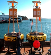 Thumbnail image for Figure 6, A photograph of the North and South surface buoys.  Photo courtesy of Sandy Baldwin.