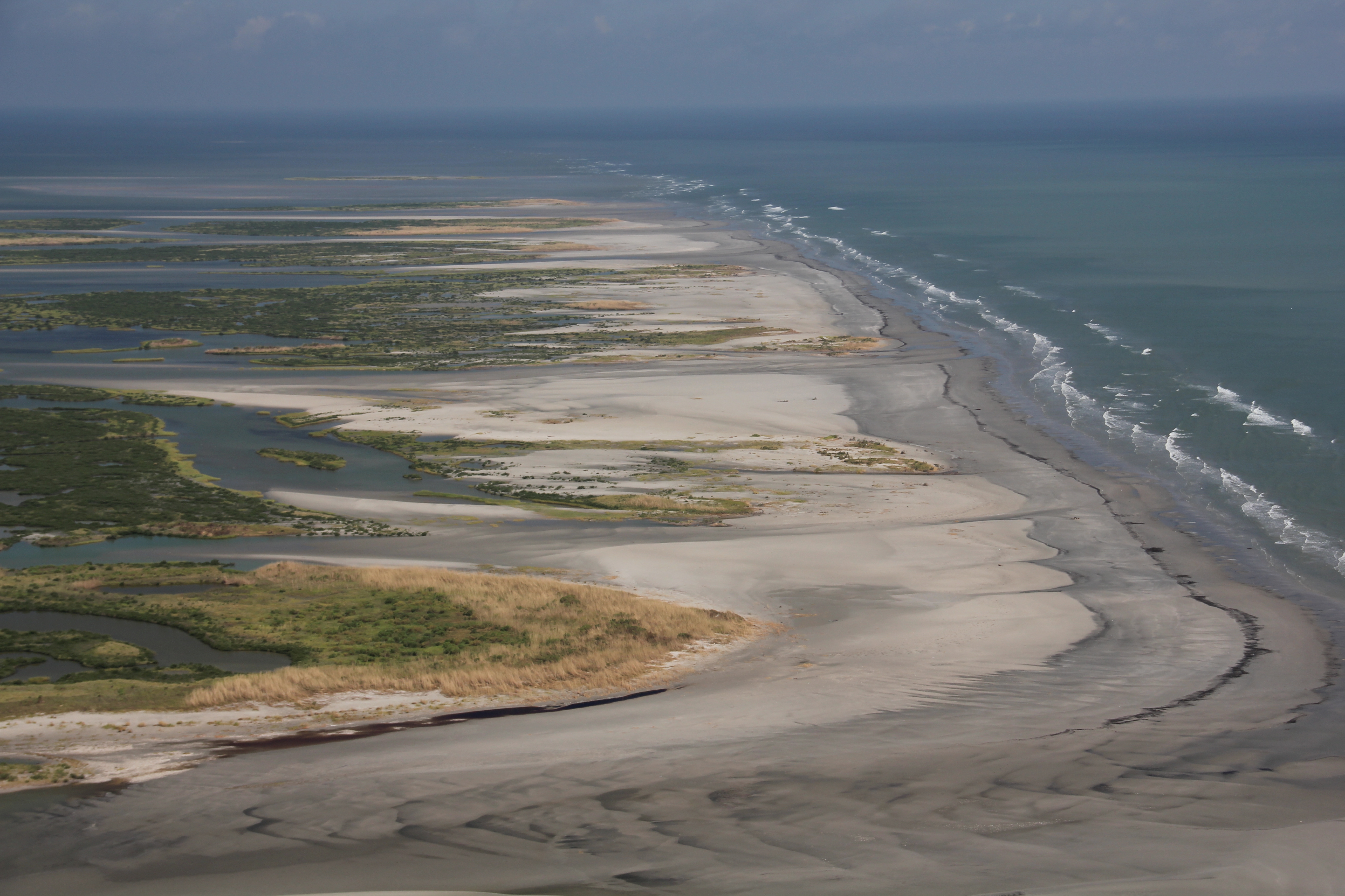 Air photo of eroded beaches and marsh
