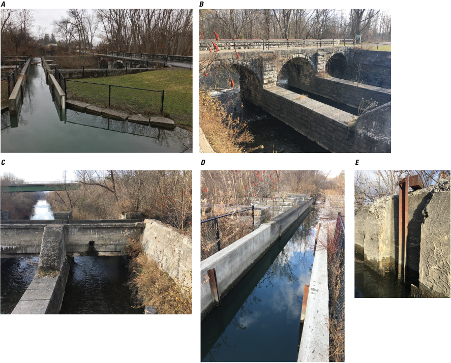 The flow of Butternut feeder is conveyed over Butternut Creek with a narrow aqueduct,
               which has brackets and outfall holes in it. The structure adjacent to the aqueduct
               shows that it used to be much wider. The old adjacent towpath is now a paved walking
               path.