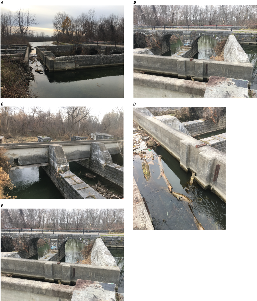 The flow of Limestone feeder is conveyed over Limestone Creek with a narrow aqueduct,
               which has brackets and outfall holes in it, and clogged by sticks. The structure on
               either side of the aqueduct shows that it used to be much wider. The old adjacent
               towpath is now a paved walking path.