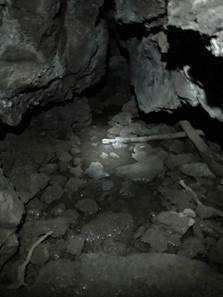 Pieces of rock can be seen through the transparent ice.