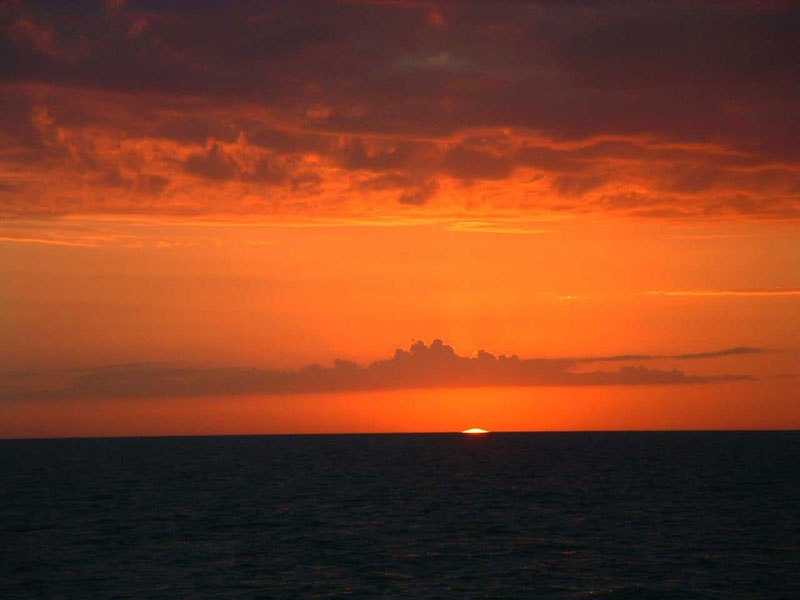 Typical sunset in the Florida Keys, caused by sunlight reflecting off atmospheric dust.