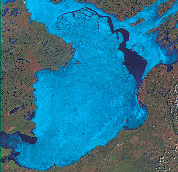 Figure 5-3B.–Three Landsat-7 ETM+ images (bands 3, 4, 5) of the breakup of ice on Great Slave Lake, Northwest Territories, Canada (at about latitude 61.5°N., longitude 14.5°W.) on (B) 20 May 2000.