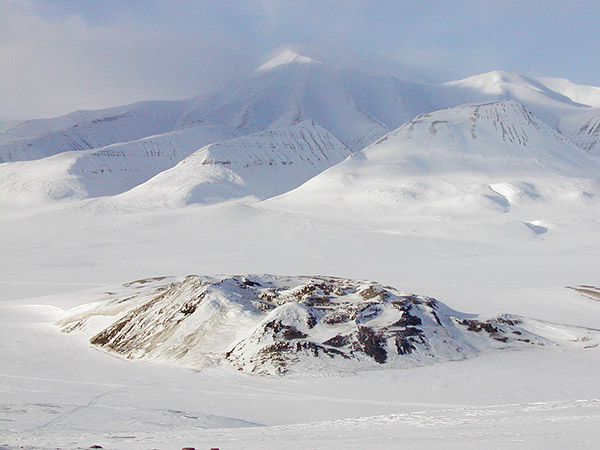 Figure 17.—Open-system pingo in upper Adventdalen, central Spitsbergen, Svalbard, Norway
(photograph by Ole Humlum, University of Oslo, Department of Geography and The University Centre in Svalbard). 
 
 