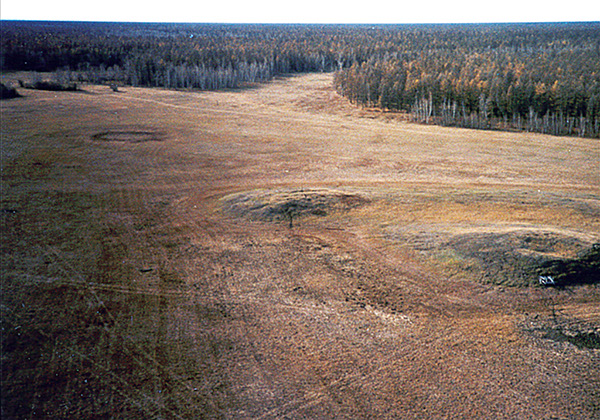 Figure 26.—Alas valley resulting from thawing of ice-rich permafrost, central Siberia, Russia (photograph by Vladimir Romanovsky, University of Alaska Fairbanks).  