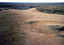 Figure 26.—Alas valley resulting from thawing of ice-rich permafrost, central Siberia, Russia (photograph by Vladimir Romanovsky, University of Alaska Fairbanks). 
