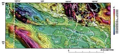 Figure 3. Shaded relief map of the aeromagnetic anomaly map, eastern Strait of Juan de Fuca-northern Puget Lowland region (figure 1). Illumination is from the northeast. Heavy white lines, coastlines. Light white lines, faults and folds of figure 2. Vertical white line on west part of diagram, boundary between two different magnetic surveys.