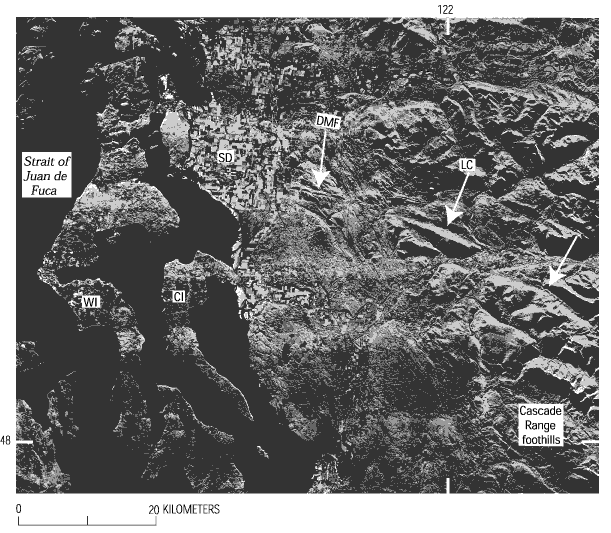 Figure 4. SLAR (side-looking airborne radar) image of portion of northwestern Washington (figure 1). White arrows show topographic lineament associated with Devils Mountain fault. Middle arrow also shows location of elongate Lake Cavanaugh (LC