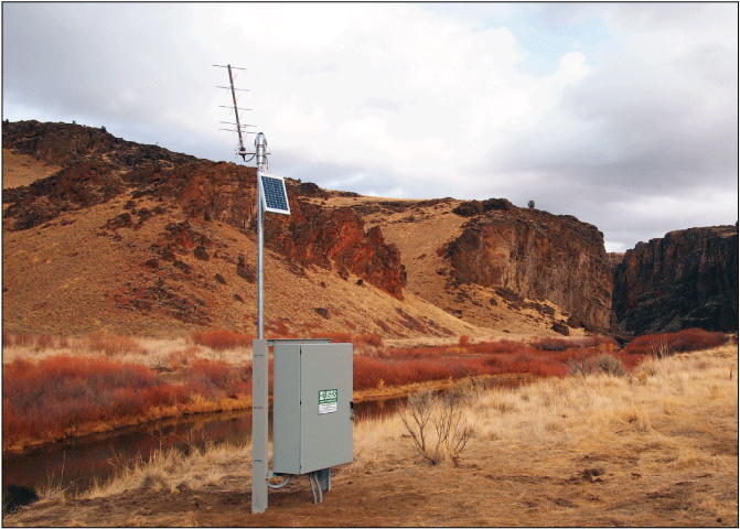 Photograph showing real-time streamgage installed on East Fork Owyhee River at Crutcher
                           Crossing (USGS 13176400), southwestern Idaho.