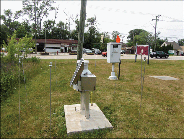 Photograph of the west view of the Rain Gage at Des Plaines, Illinois.