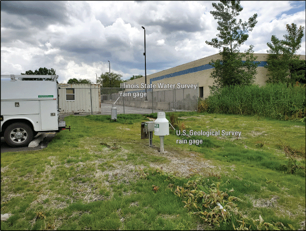 Photograph of the southwest view of the Rain Gage at Harvey, Illinois.