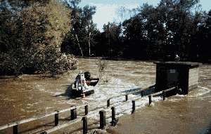 USGS staff making discharge measurement during flooding on the Tar River near Rocky Mount, N.C.