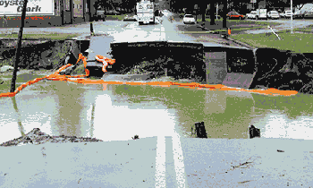 Road damage from flooding in Greenville, N.C.